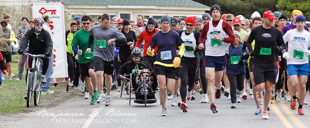 Runners and hand cyclists take off at the start of the Race Vermont Unplugged Half Marathon in Burlington, Vermont