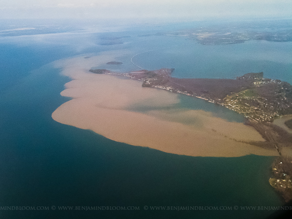 Silt and debris floods into Lake Champlain from the Winooski River